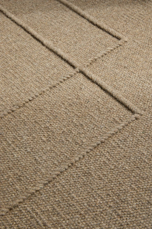 Brink & Campman Senso Level Fur Brown rug in camel brown with two rectangles in relief, shown in an interior, second view