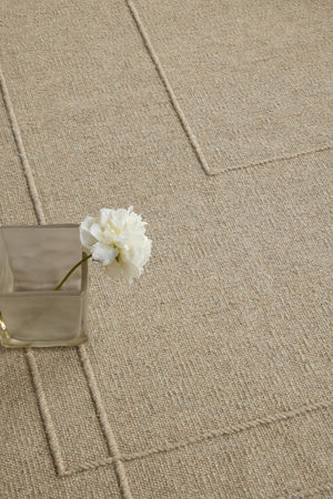 Brink & Campman Senso Level Natural rug in sand beige with two rectangles in relief, shown in an interior, second view