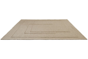 Brink & Campman Senso Planes Natural rug in sand beige with overlapping rectangles in relief, perspective view