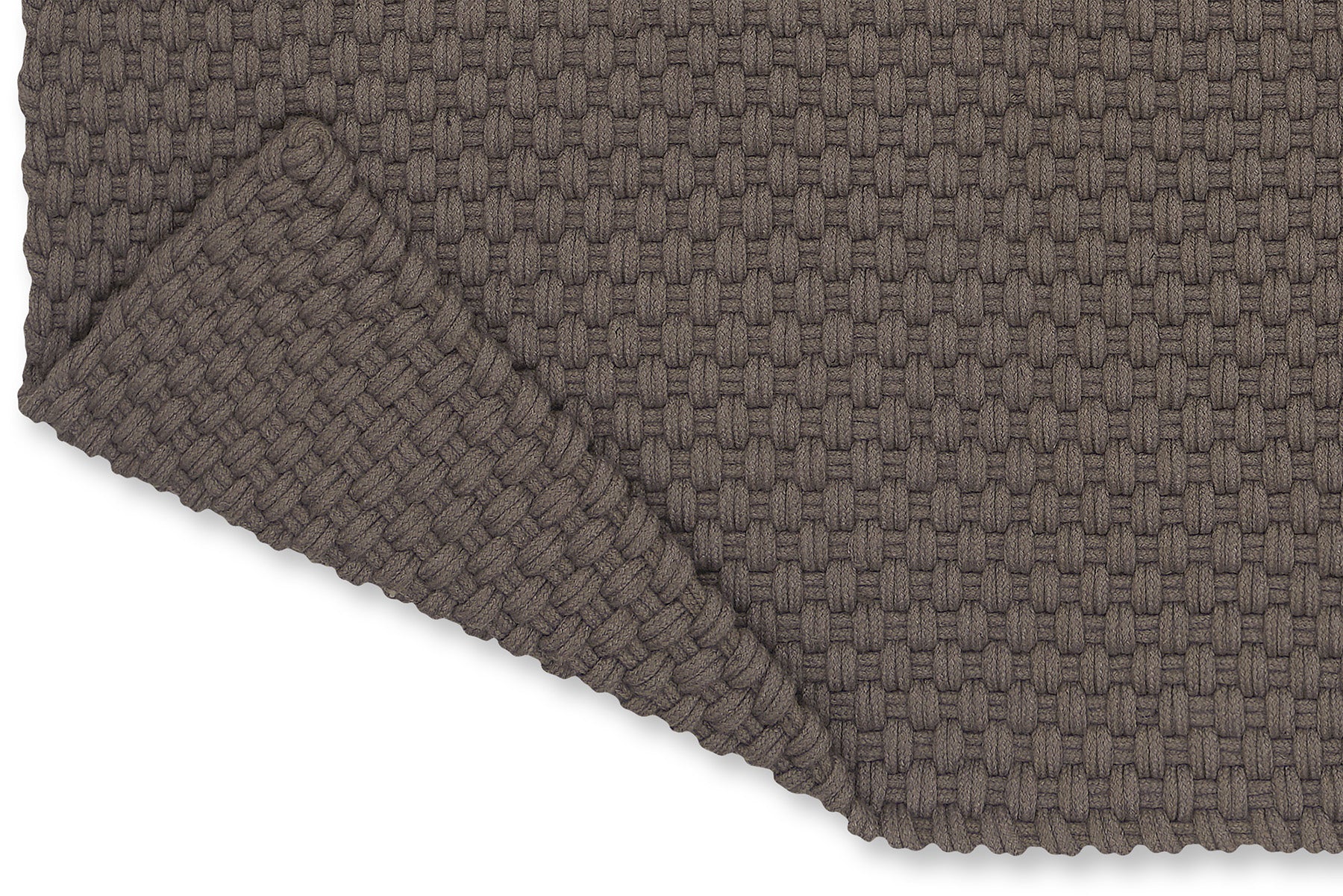 Close-up of recycled PET flatweave texture in soft grey and taupe tones

