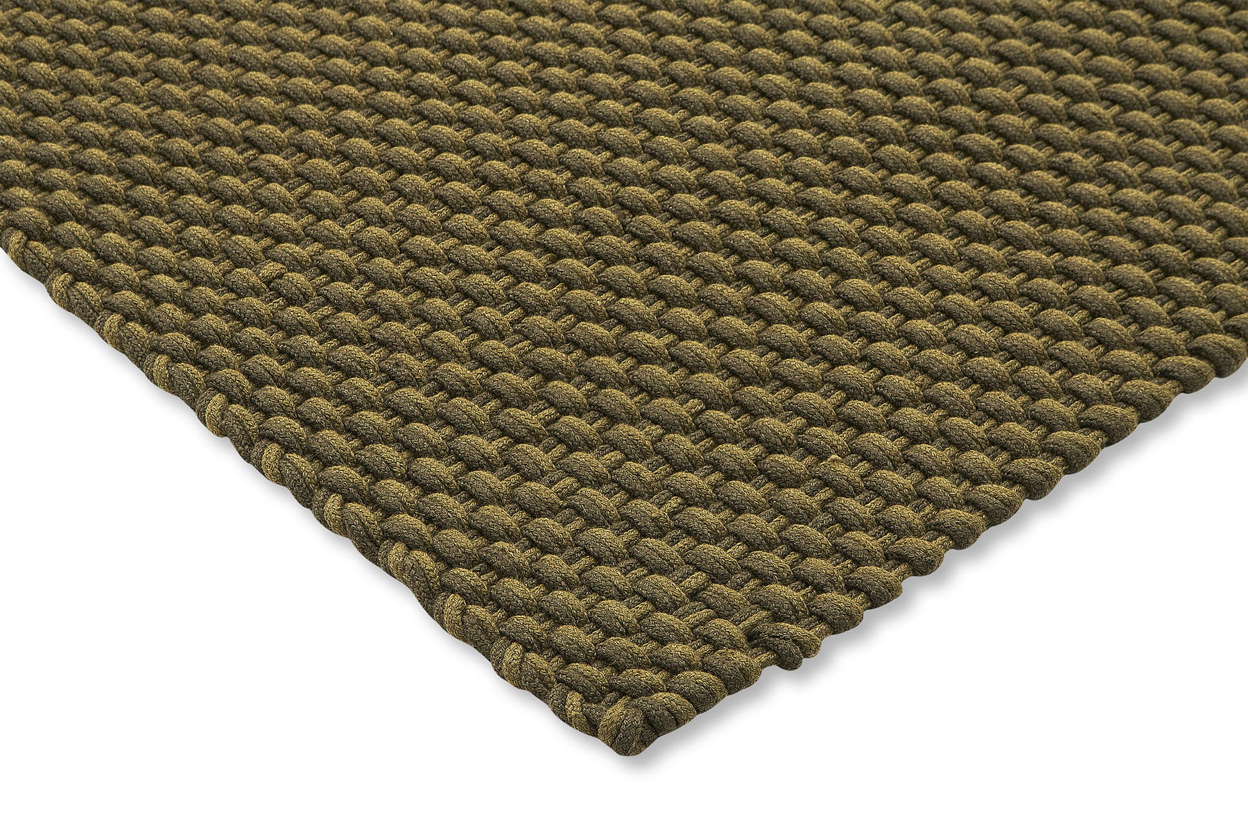 Corner view of Lace Thyme Pine rug showing braided surface and stitched edge