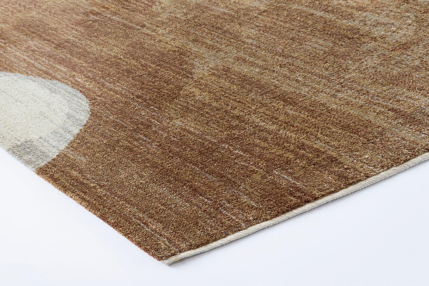 Corner detail of Fuji rug showing fine edge finish and low-pile weave