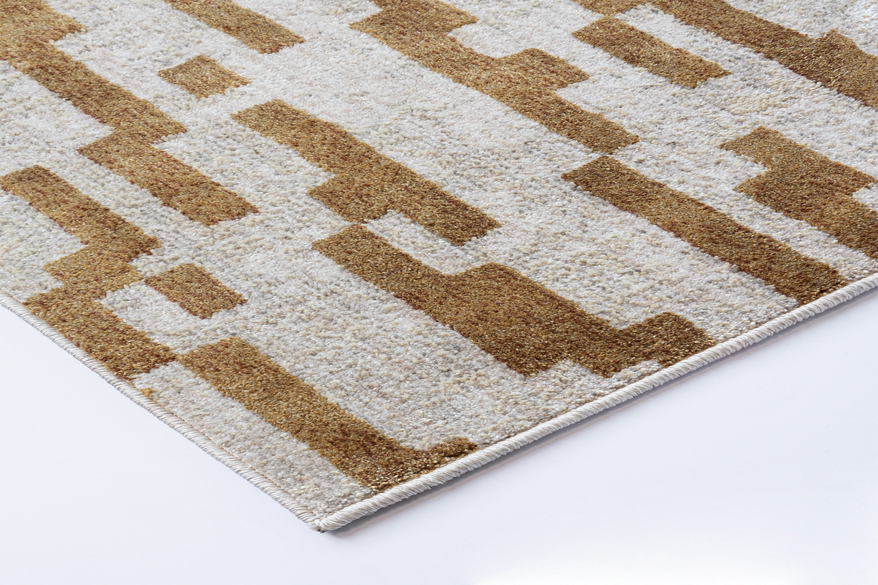 Corner detail of Acsento Jura Multi 1 rug with clean edge and subtle colour blending

