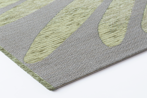Corner of Acsento Salerno Pine rug showing edge detail, tight weave, and deep pine colour

