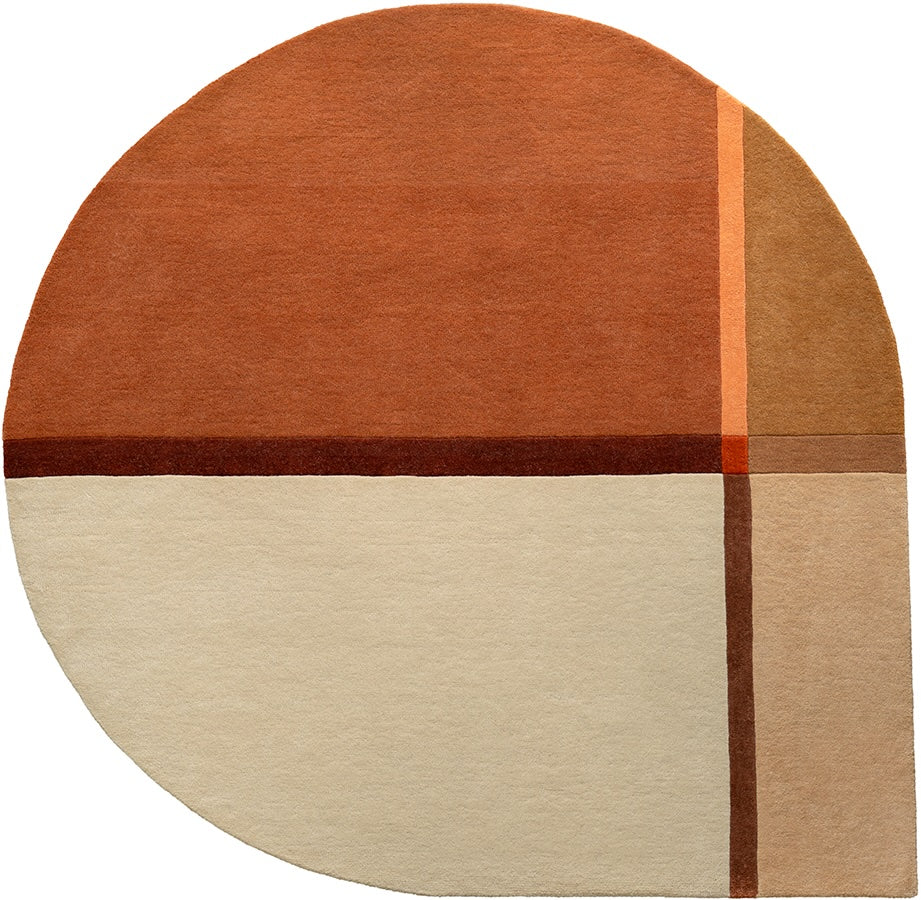 Top-down view of Acsento Palau Girare Terra wool rug showing complete terra-toned spiral pattern

