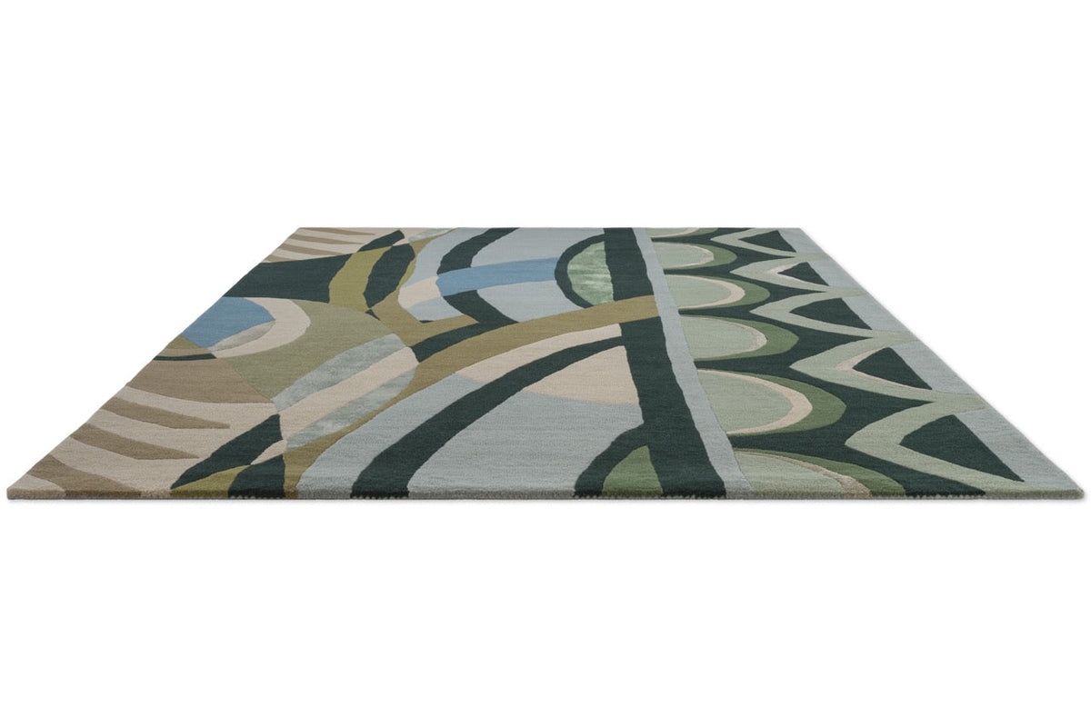 Harlequin Atelier Lagoon rug in bottle green, sea green and sky blue, perspective view