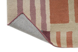 Harlequin Monolith Cinnabar Amber rug, detail of folded corner and backing