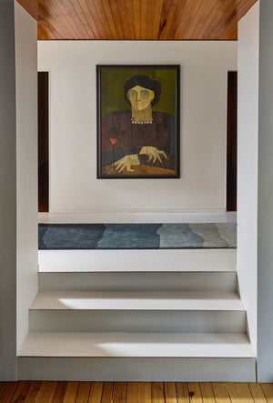 Harlequin Sedimentary Midnight runner in petrol blue and midnight blue, shown in an interior