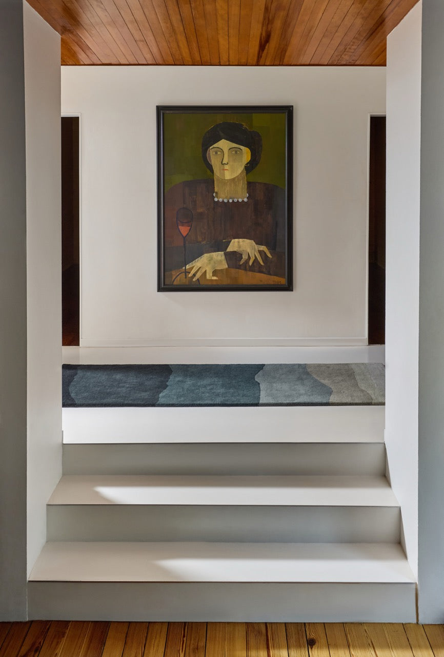 Harlequin Sedimentary Midnight runner in petrol blue and midnight blue, shown in an interior