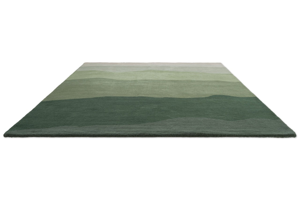 Harlequin Sedimentary Pine rug in pine green and sage, perspective view