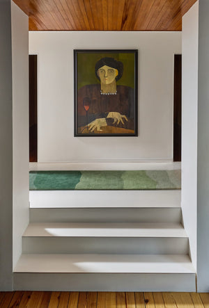 Harlequin Sedimentary Pine runner in pine green and sage, shown in an interior