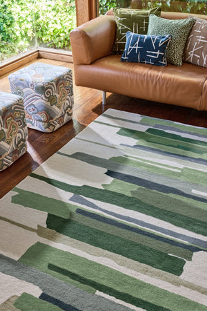 Harlequin Zeal Forest rug in ivory with green brushstrokes, shown in an interior, second view