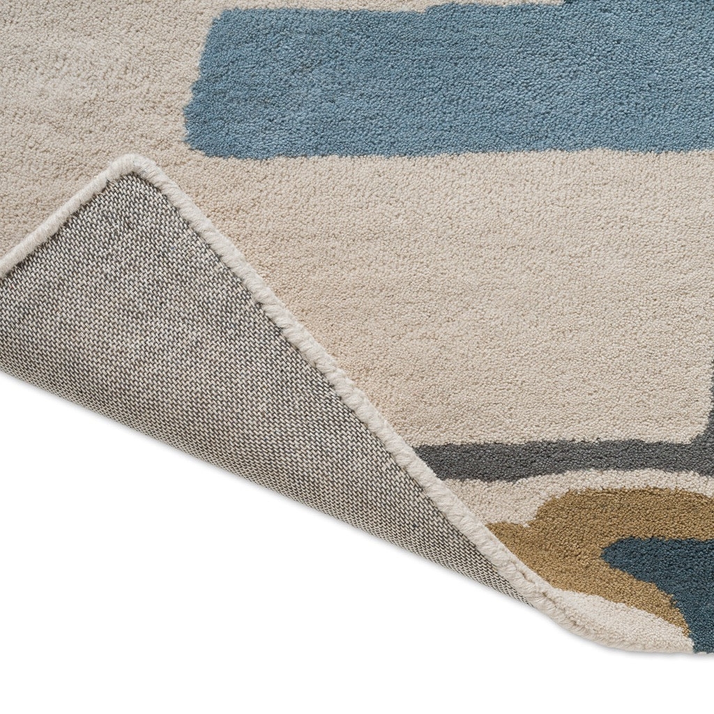Harlequin Zeal Indigo rug, detail of folded corner and backing