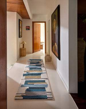 Harlequin Zeal Indigo runner in ivory with blue and ochre brushstrokes, second top view