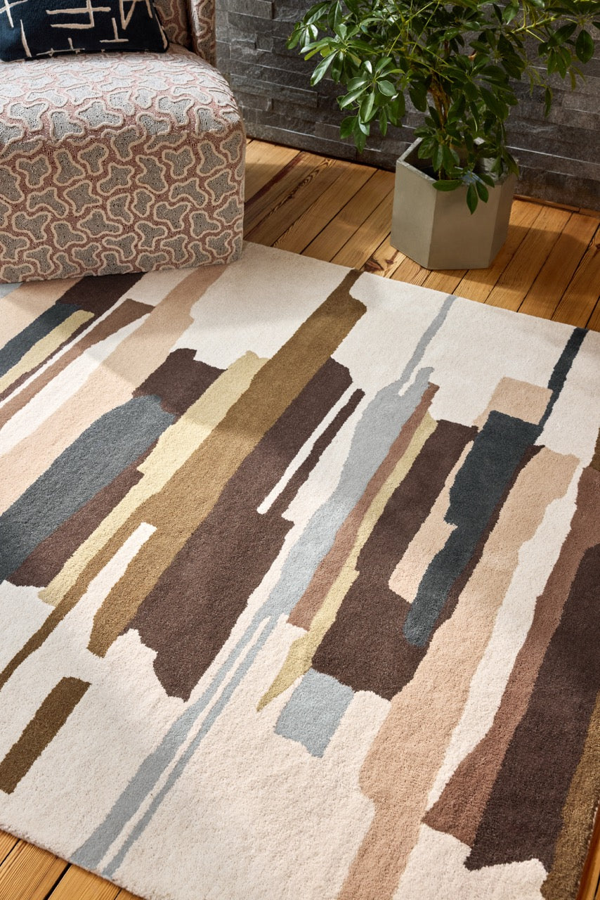 Harlequin Zeal Taupe rug in ivory with brown and blush brushstrokes, shown in an interior, second view