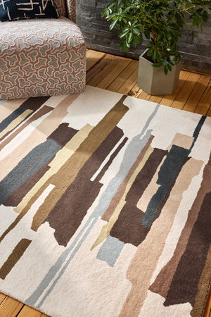 Harlequin Zeal Taupe rug in ivory with brown and blush brushstrokes, shown in an interior, second view