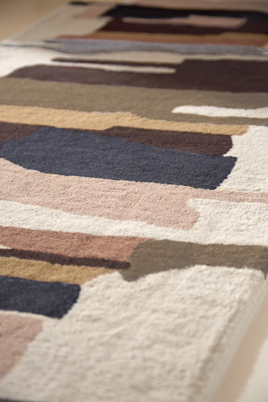 Harlequin Zeal Taupe runner in ivory with brown and blush brushstrokes, shown in an interior, second view