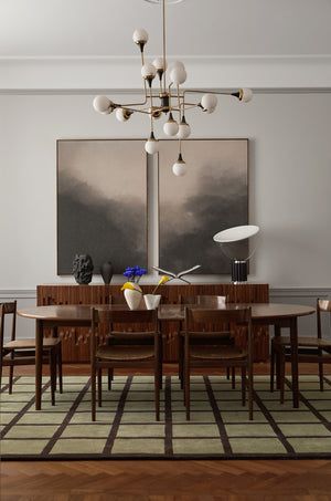 Layered Avenue Checked Olive rug styled in a modern living room with neutral furnishings and natural accents.

