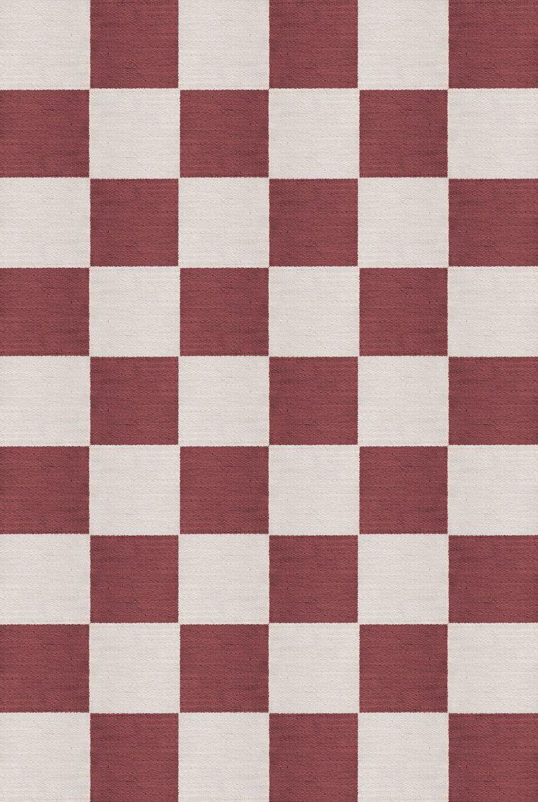 Top-down image of the Chess Flatweave Burgundy rug showing full checker layout in soft geometric rhythm

