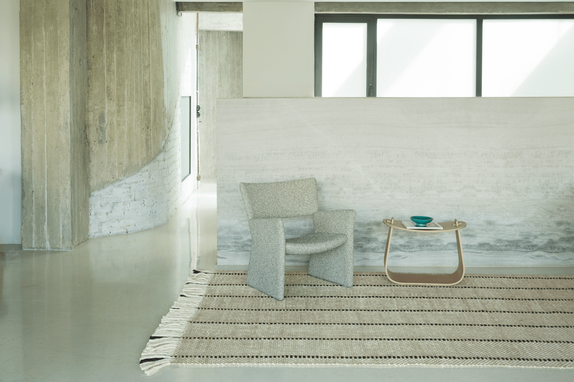 Black White Striped Wool Rug, Layered Cord, in a living room