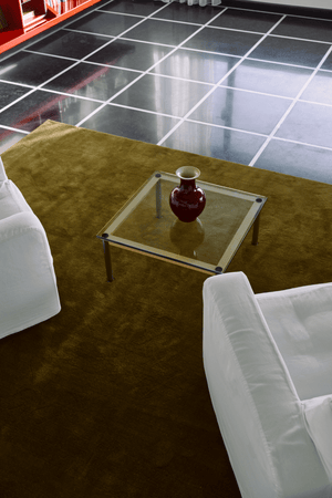 Khaki Wool Rug, Layered Solid Wool Green Umber, close up in an interior