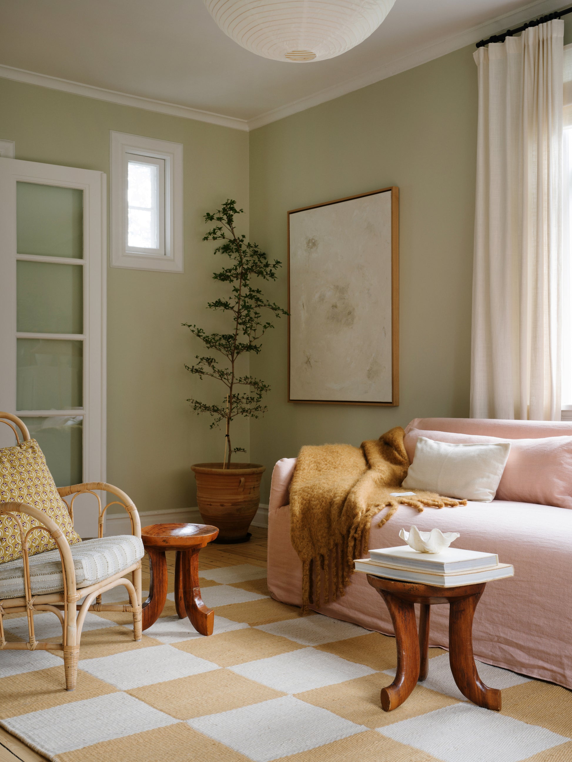 Layered Chess Harvest Yellow rug styled in a neutral-toned living space with oak furniture and soft textiles