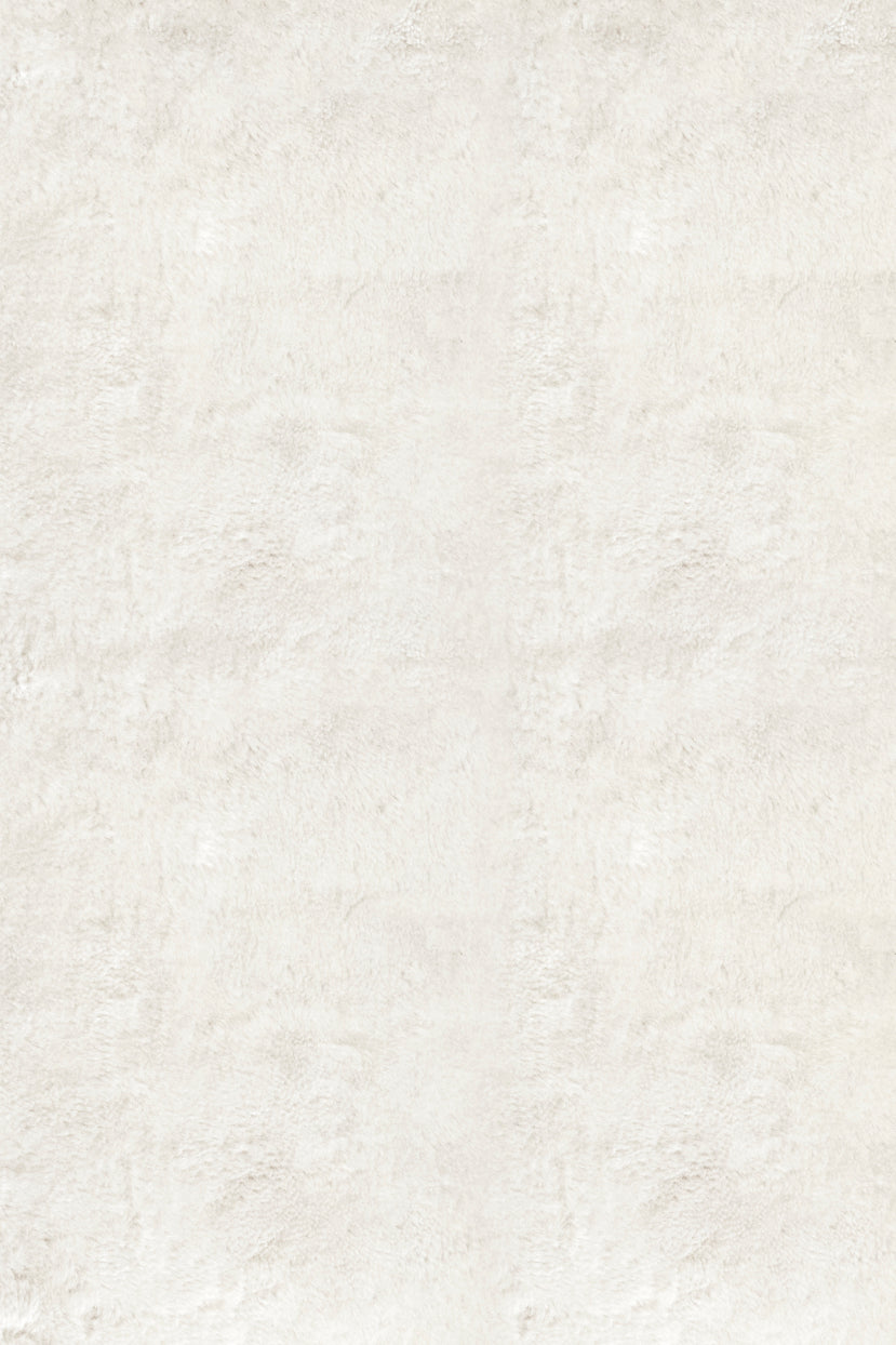 Top-down image of Artisan Bone White rug showing clean, minimal surface in off-white tone

