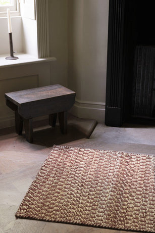 Burgundy Jute Rug, Layered Barley Burgundy, in an interior