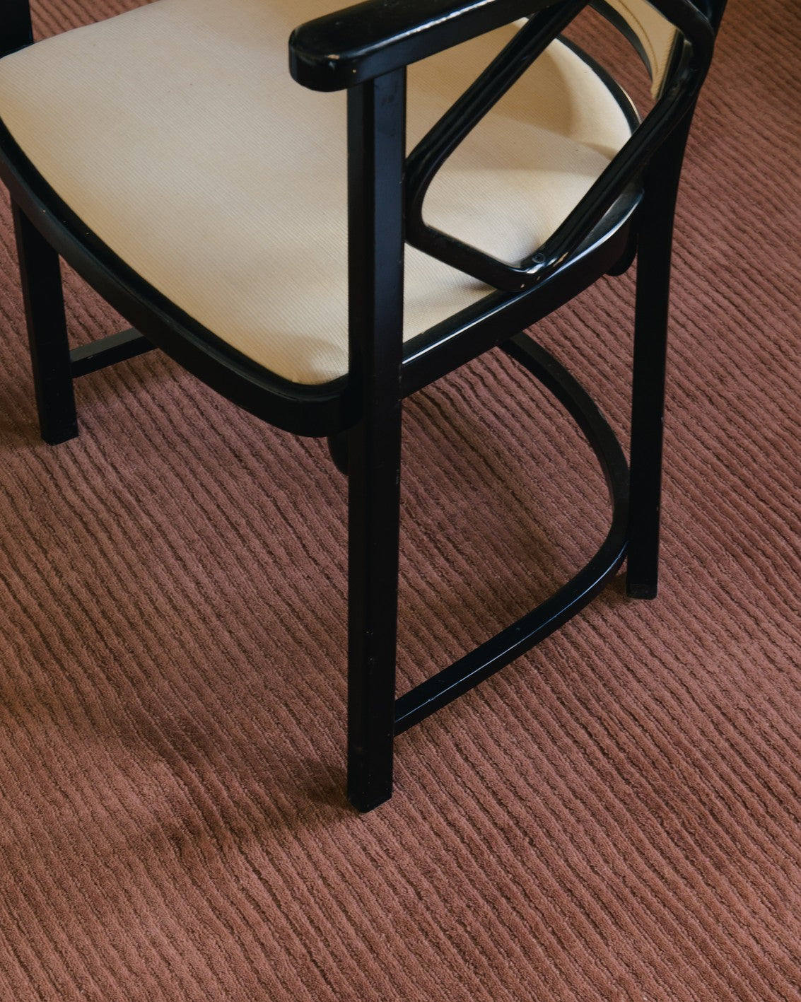Rust Wool Rug, Layered Drift Wool Rust, close up in an interior