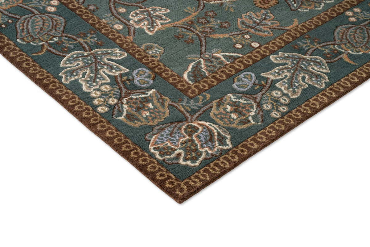 Morris & Co Theodosia Bottle Green rug, detail of corner and pile