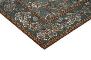 Morris & Co Theodosia Bottle Green rug, detail of corner and pile
