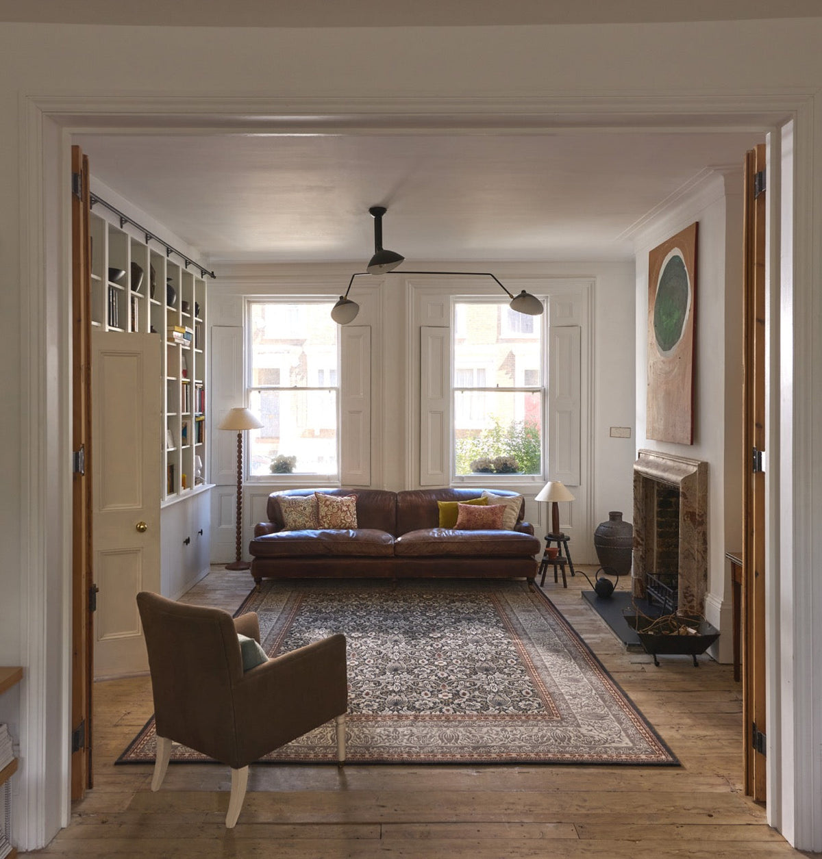 Morris & Co Borage Grey rug in stone grey, ivory and ochre, shown in an interior