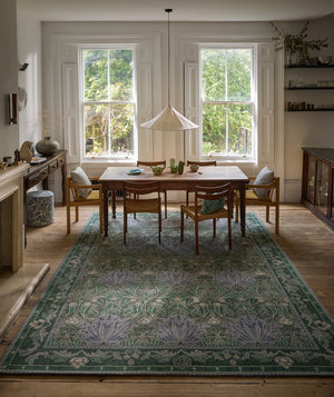 Morris & Co Helena Mineral rug in sea green and lavender blue, shown in an interior