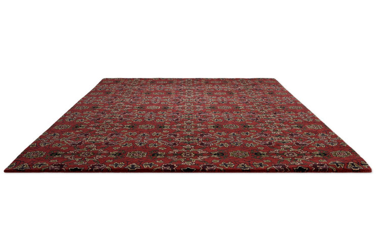 Morris & Co Persian Scroll Plum rug in warm red with cream, olive and aubergine, perspective view