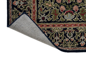 Morris & Co Wilton Weave Indigo rug, detail of folded corner and backing