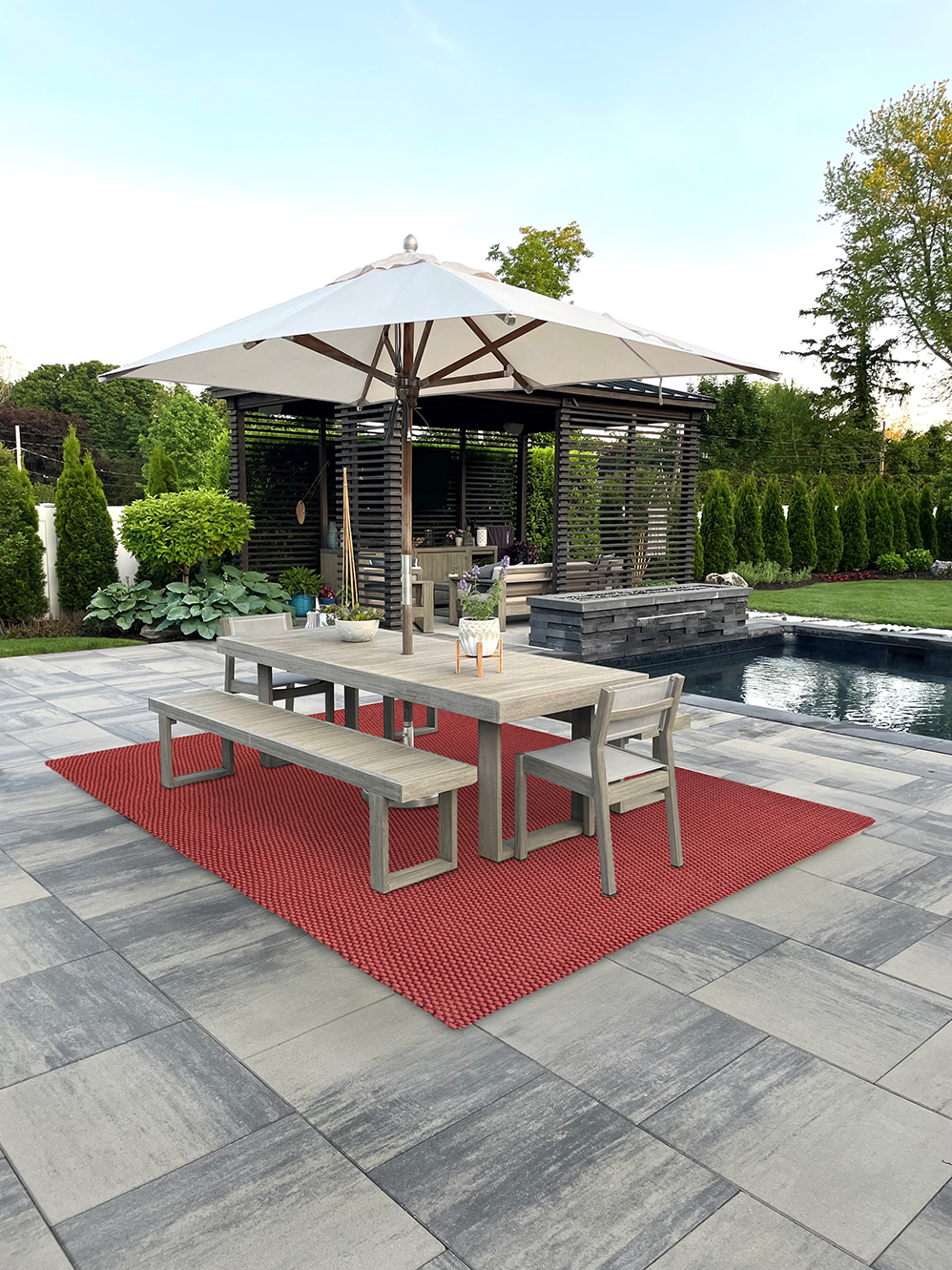 Acsento Chania Brick PET rug styled in a neutral indoor-outdoor living space

