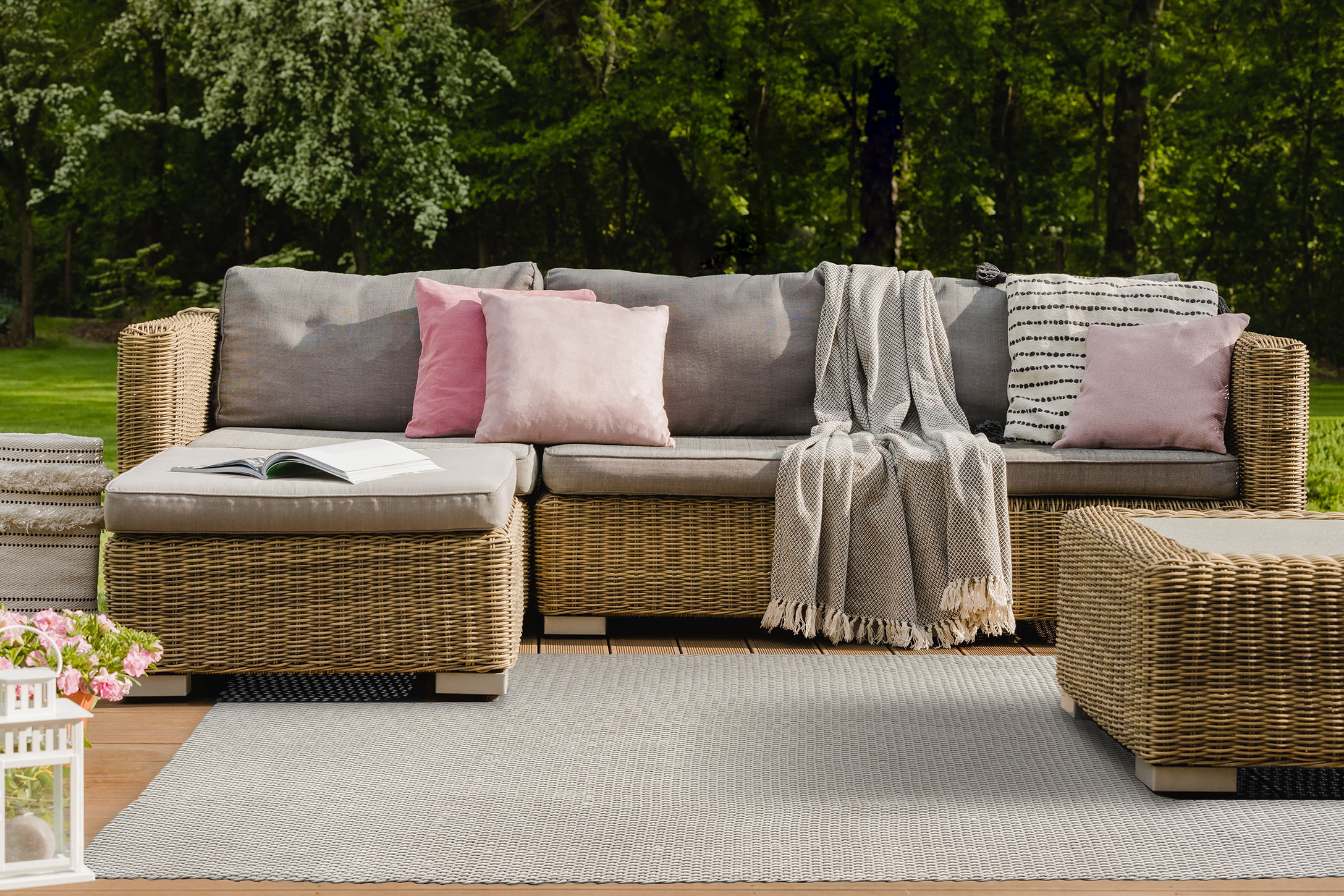 Acsento Chania Ivory PET rug styled in a bright, coastal-inspired living room with pale wood accents

