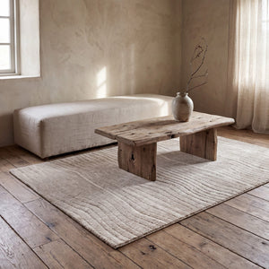 Acsento Duna Linen rug in linen beige with fine wavy lines, shown in an interior
