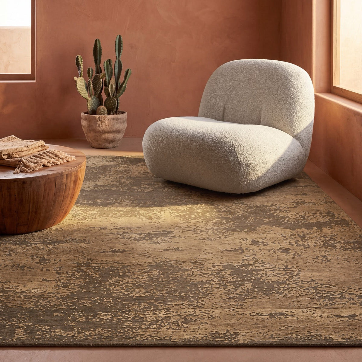 Acsento Laguna Bronze rug in bronze brown with sand coloured flecks, shown in an interior