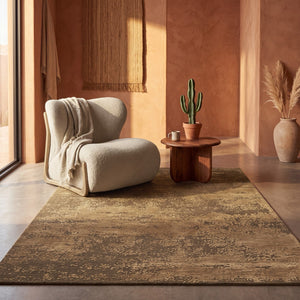 Acsento Laguna Bronze rug in bronze brown with sand coloured flecks, shown in an interior, second view