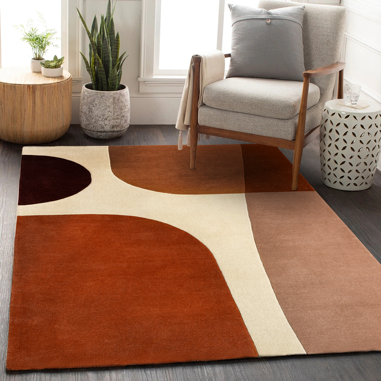 Acsento Lipari Terra wool rug styled in a contemporary living space with textured neutrals and soft lighting

