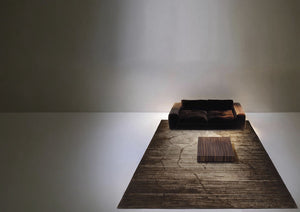 Acsento Moonshadow Chocolate rug in dark brown shading from chocolate to champagne, shown in an interior