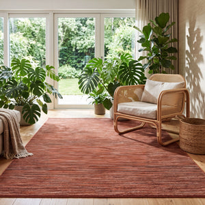 Acsento Origin Brick rug in terracotta with brick red and brown stripes, shown in an interior
