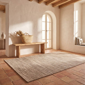 Acsento Origin Green rug in sage green with khaki and grey stripes, shown in an interior