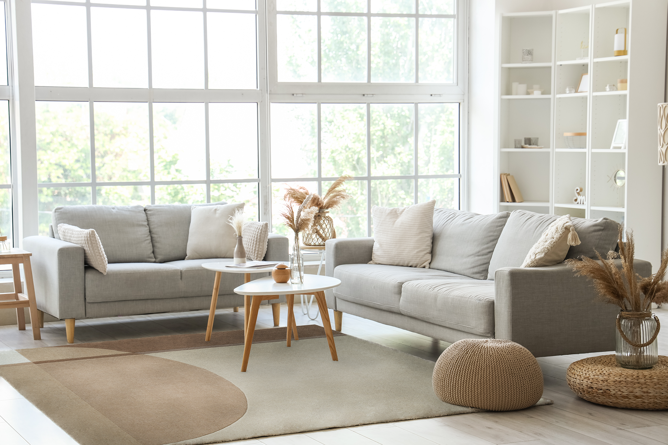 Acsento Palau Beige rug styled in a neutral living room with warm wood and soft upholstery

