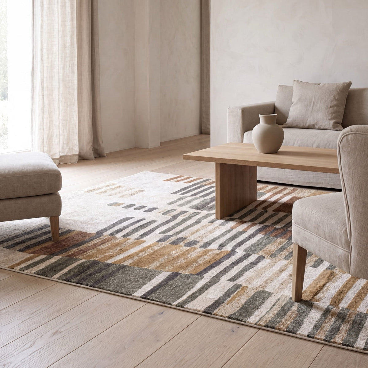 Acsento Siena 45 rug in beige with brushstrokes in rust, ochre and charcoal, shown in an interior, second view