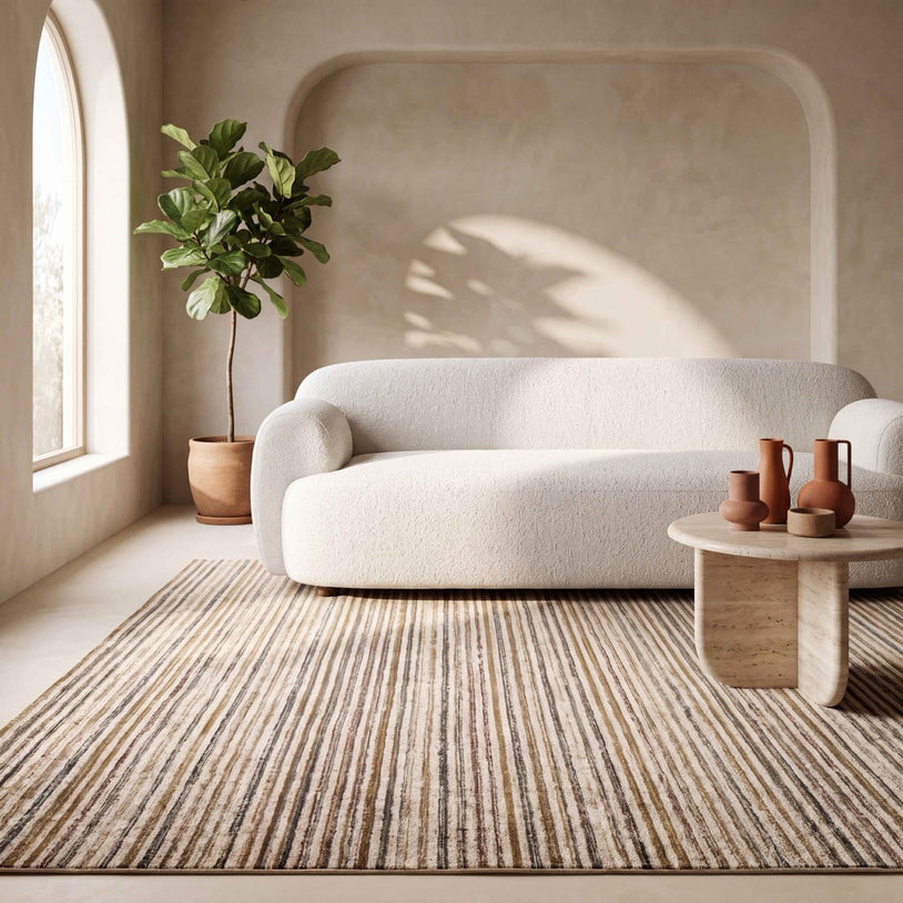 Acsento Siena 51 rug in beige with fine stripes in sand, caramel and ochre, shown in an interior