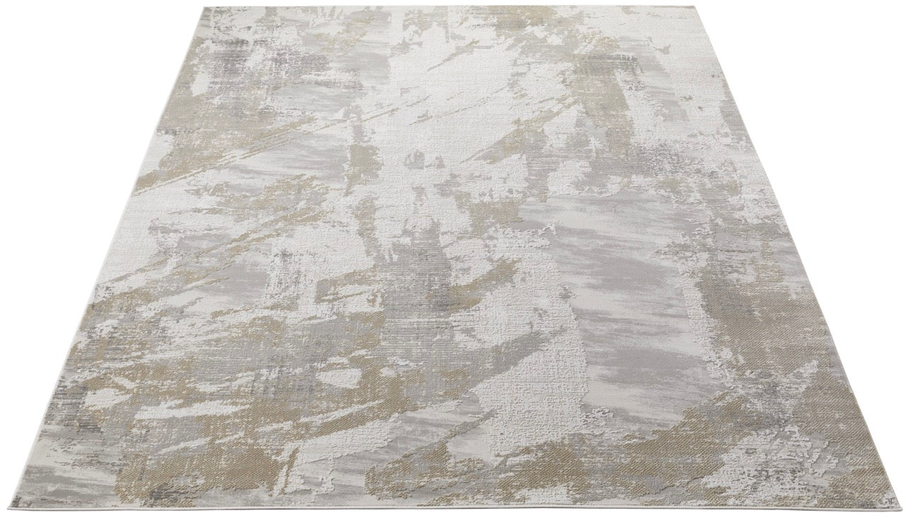  part of a sofa and books on a table.