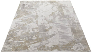  part of a sofa and books on a table.