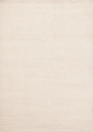 Top-down image of Lace White Sand rug with soft neutral weave and sun-washed palette
